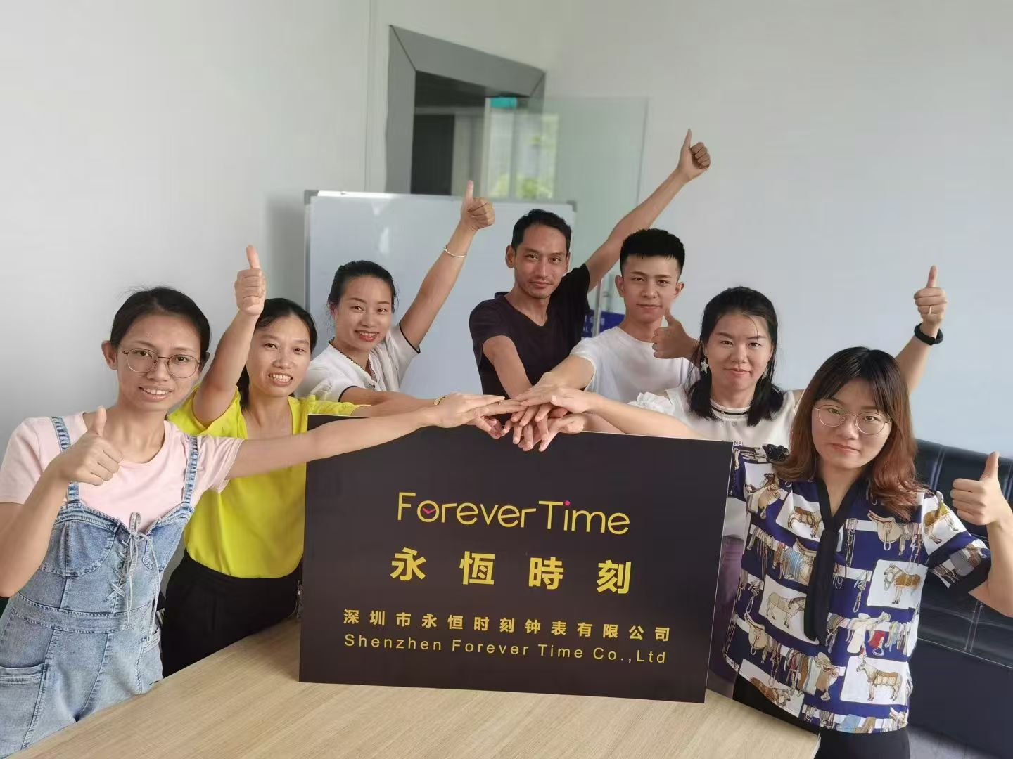 Forever Time team members gathered at the Shenzhen office
